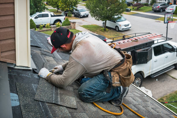 Professional Storm Damage Roof Repair technician working in Fairfax, OH